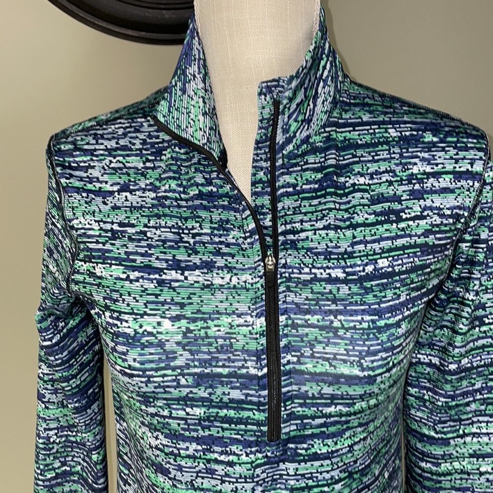 Nike Dri-Fit Women’s Medium long sleeve 1/4  zip pullover.